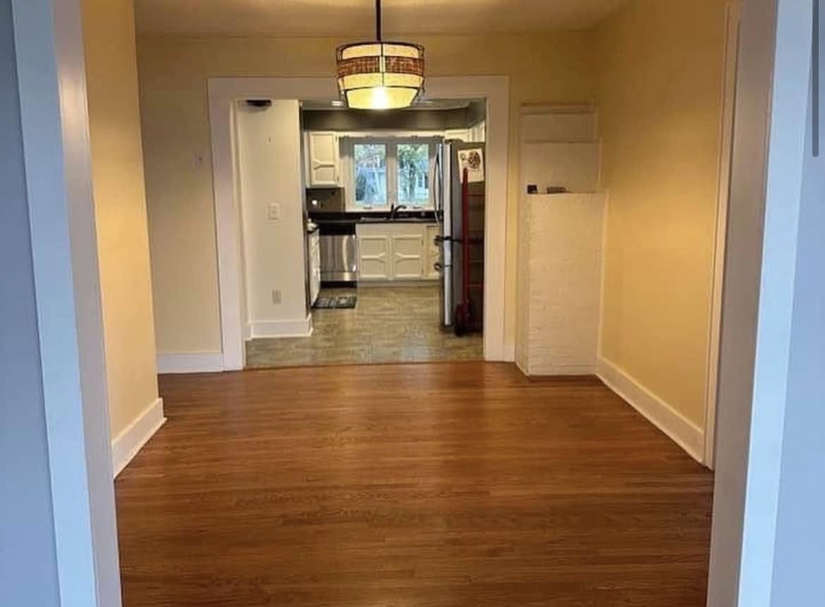 Narrow dining area before home remodel project by Vanderlee Construction, LLC
